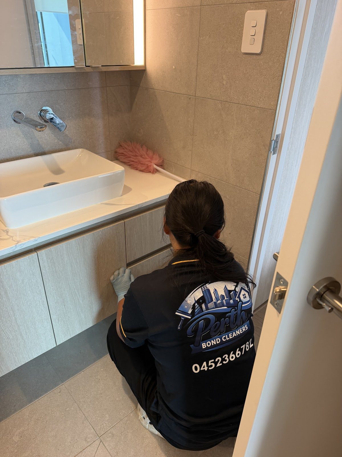 Perth Bond Cleaners team member cleaning a bathroom